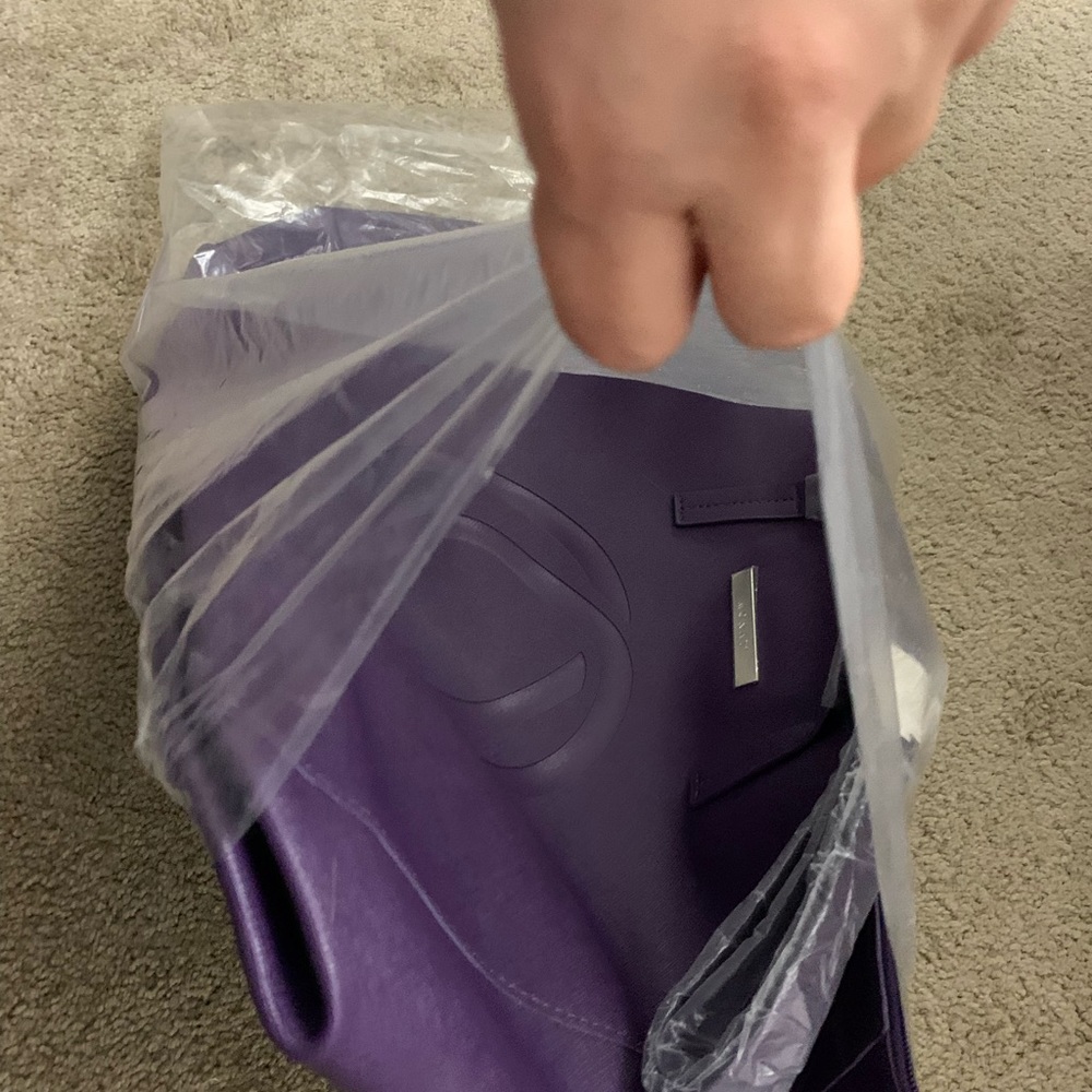 Large New In plastic Monat Tote
